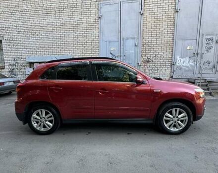 Красный Мицубиси АСХ, объемом двигателя 1.8 л и пробегом 210 тыс. км за 11500 $, фото 3 на Automoto.ua