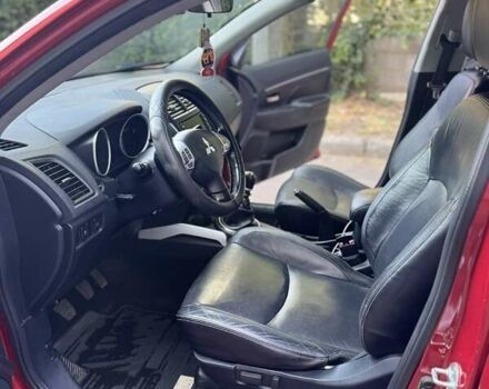 Красный Мицубиси АСХ, объемом двигателя 1.8 л и пробегом 210 тыс. км за 11500 $, фото 13 на Automoto.ua