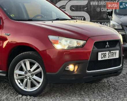 Червоний Міцубісі АСХ, об'ємом двигуна 1.8 л та пробігом 182 тис. км за 10999 $, фото 7 на Automoto.ua