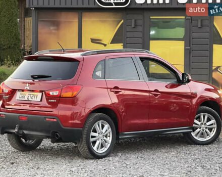 Червоний Міцубісі АСХ, об'ємом двигуна 1.8 л та пробігом 182 тис. км за 10999 $, фото 25 на Automoto.ua