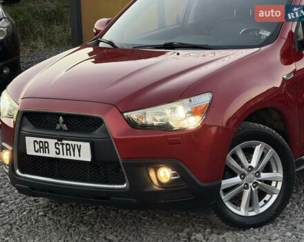 Червоний Міцубісі АСХ, об'ємом двигуна 1.8 л та пробігом 182 тис. км за 10999 $, фото 13 на Automoto.ua