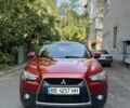 Красный Мицубиси АСХ, объемом двигателя 1.8 л и пробегом 210 тыс. км за 11500 $, фото 1 на Automoto.ua