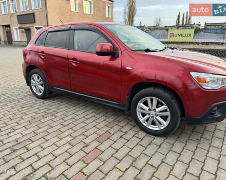 Красный Мицубиси АСХ, объемом двигателя 1.59 л и пробегом 150 тыс. км за 9000 $, фото 3 на Automoto.ua