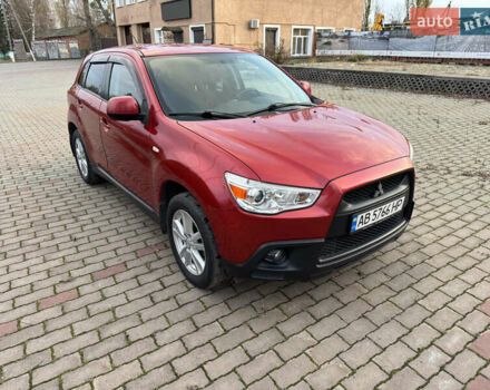 Красный Мицубиси АСХ, объемом двигателя 1.59 л и пробегом 150 тыс. км за 9000 $, фото 1 на Automoto.ua