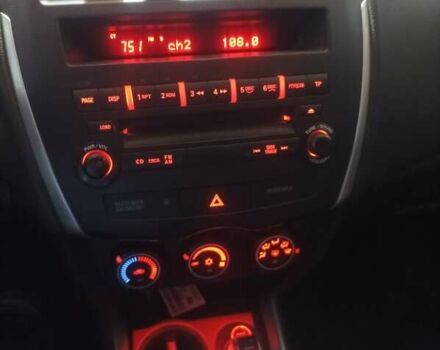 Красный Мицубиси АСХ, объемом двигателя 1.59 л и пробегом 171 тыс. км за 8850 $, фото 5 на Automoto.ua