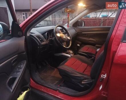 Красный Мицубиси АСХ, объемом двигателя 1.59 л и пробегом 171 тыс. км за 8850 $, фото 3 на Automoto.ua