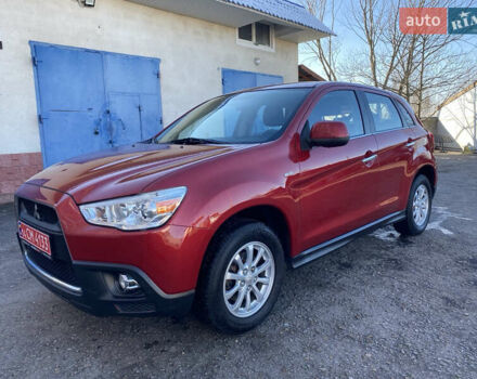 Красный Мицубиси АСХ, объемом двигателя 1.8 л и пробегом 234 тыс. км за 8900 $, фото 1 на Automoto.ua