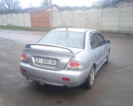 Серый Мицубиси АСХ, объемом двигателя 2 л и пробегом 222 тыс. км за 2850 $, фото 3 на Automoto.ua