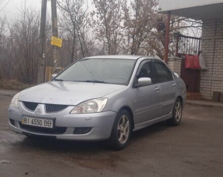 Серый Мицубиси АСХ, объемом двигателя 2 л и пробегом 222 тыс. км за 2850 $, фото 1 на Automoto.ua