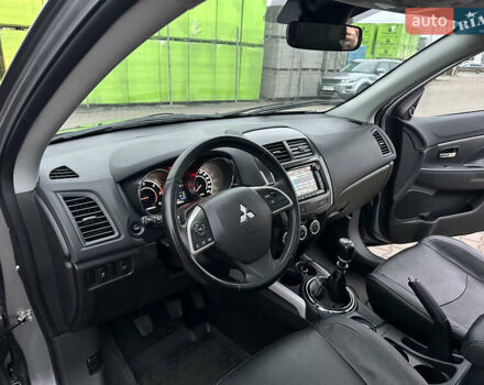 Серый Мицубиси АСХ, объемом двигателя 1.8 л и пробегом 215 тыс. км за 13800 $, фото 26 на Automoto.ua