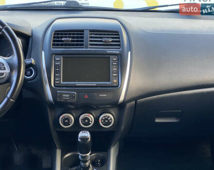 Синий Мицубиси АСХ, объемом двигателя 1.8 л и пробегом 232 тыс. км за 8100 $, фото 19 на Automoto.ua