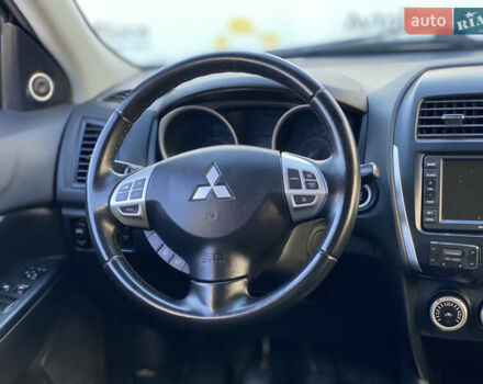 Синий Мицубиси АСХ, объемом двигателя 1.8 л и пробегом 232 тыс. км за 8100 $, фото 18 на Automoto.ua