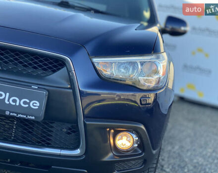 Синий Мицубиси АСХ, объемом двигателя 1.8 л и пробегом 232 тыс. км за 8100 $, фото 73 на Automoto.ua