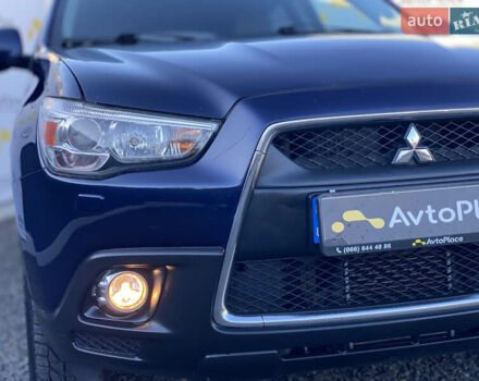 Синий Мицубиси АСХ, объемом двигателя 1.8 л и пробегом 232 тыс. км за 8100 $, фото 72 на Automoto.ua