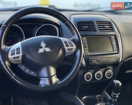 Синий Мицубиси АСХ, объемом двигателя 1.8 л и пробегом 232 тыс. км за 8100 $, фото 20 на Automoto.ua