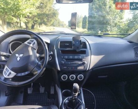 Синий Мицубиси АСХ, объемом двигателя 1.8 л и пробегом 258 тыс. км за 9500 $, фото 17 на Automoto.ua