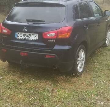 Синий Мицубиси АСХ, объемом двигателя 1.8 л и пробегом 236 тыс. км за 10000 $, фото 9 на Automoto.ua