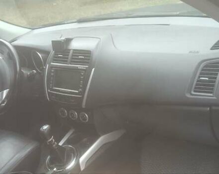 Синий Мицубиси АСХ, объемом двигателя 1.8 л и пробегом 236 тыс. км за 10000 $, фото 3 на Automoto.ua