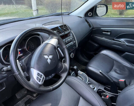 Синій Міцубісі АСХ, об'ємом двигуна 2 л та пробігом 242 тис. км за 9999 $, фото 10 на Automoto.ua
