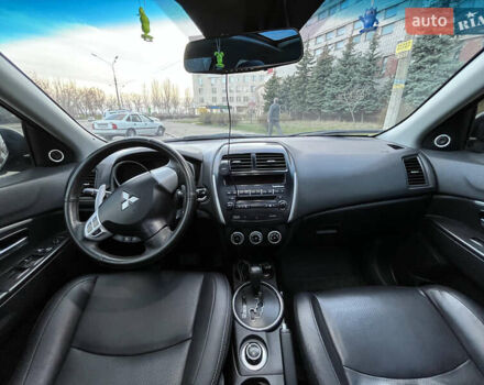 Синій Міцубісі АСХ, об'ємом двигуна 2 л та пробігом 242 тис. км за 9999 $, фото 9 на Automoto.ua