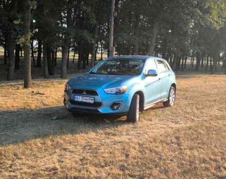 Синій Міцубісі АСХ, об'ємом двигуна 2 л та пробігом 138 тис. км за 11000 $, фото 1 на Automoto.ua