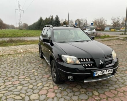 Черный Мицубиси Аиртрек, объемом двигателя 2 л и пробегом 208 тыс. км за 6200 $, фото 1 на Automoto.ua