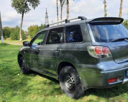 Сірий Міцубісі Аіртрек, об'ємом двигуна 2.4 л та пробігом 299 тис. км за 6099 $, фото 1 на Automoto.ua