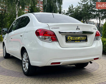 Мицубиси Эттрейдж 2014 в Львове на Automoto.ua Белый Мицубиси Эттрейдж, объемом двигателя 1.2 л и пробегом 191 тыс. км за 5999 $, фото 4 на Automoto.ua