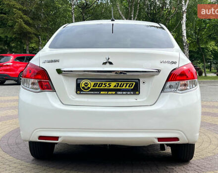 Мицубиси Эттрейдж 2014 в Львове на Automoto.ua Белый Мицубиси Эттрейдж, объемом двигателя 1.2 л и пробегом 191 тыс. км за 5999 $, фото 5 на Automoto.ua