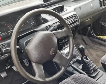 Сірий Міцубісі Браво, об'ємом двигуна 1.8 л та пробігом 520 тис. км за 1999 $, фото 4 на Automoto.ua