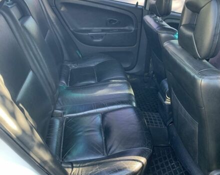 Белый Мицубиси Харизма, объемом двигателя 1.6 л и пробегом 554 тыс. км за 3500 $, фото 2 на Automoto.ua