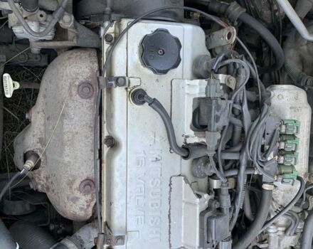 Белый Мицубиси Харизма, объемом двигателя 1.6 л и пробегом 554 тыс. км за 3500 $, фото 7 на Automoto.ua