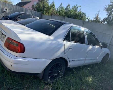 Белый Мицубиси Харизма, объемом двигателя 1.6 л и пробегом 554 тыс. км за 3500 $, фото 1 на Automoto.ua