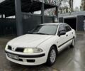 Белый Мицубиси Харизма, объемом двигателя 1.83 л и пробегом 290 тыс. км за 3100 $, фото 1 на Automoto.ua