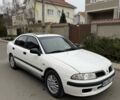 Белый Мицубиси Харизма, объемом двигателя 1.83 л и пробегом 290 тыс. км за 2900 $, фото 1 на Automoto.ua
