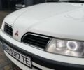 Белый Мицубиси Харизма, объемом двигателя 1.83 л и пробегом 290 тыс. км за 3100 $, фото 9 на Automoto.ua
