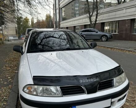 Белый Мицубиси Харизма, объемом двигателя 1.6 л и пробегом 356 тыс. км за 3600 $, фото 1 на Automoto.ua