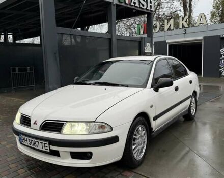 Белый Мицубиси Харизма, объемом двигателя 1.83 л и пробегом 290 тыс. км за 3100 $, фото 1 на Automoto.ua