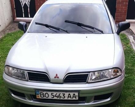Белый Мицубиси Харизма, объемом двигателя 1.9 л и пробегом 183 тыс. км за 2650 $, фото 1 на Automoto.ua