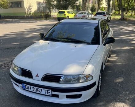 Білий Міцубісі Харизма, об'ємом двигуна 1.8 л та пробігом 276 тис. км за 2999 $, фото 1 на Automoto.ua