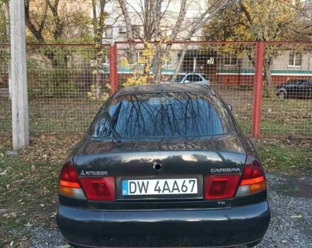 Міцубісі Харизма 1997 у Краматорске на Automoto.ua Чорний Міцубісі Харизма, об'ємом двигуна 0 л та пробігом 100 тис. км за 716 $, фото 5 на Automoto.ua