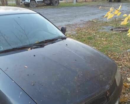 Міцубісі Харизма 1997 у Краматорске на Automoto.ua Чорний Міцубісі Харизма, об'ємом двигуна 0 л та пробігом 100 тис. км за 716 $, фото 3 на Automoto.ua
