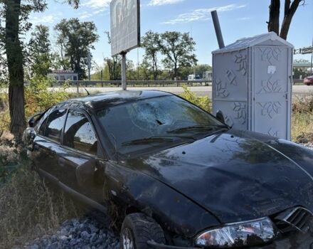 Черный Мицубиси Харизма, объемом двигателя 0 л и пробегом 200 тыс. км за 1000 $, фото 1 на Automoto.ua