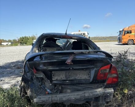 Черный Мицубиси Харизма, объемом двигателя 0 л и пробегом 200 тыс. км за 1000 $, фото 2 на Automoto.ua