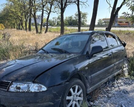 Черный Мицубиси Харизма, объемом двигателя 0 л и пробегом 200 тыс. км за 1000 $, фото 4 на Automoto.ua