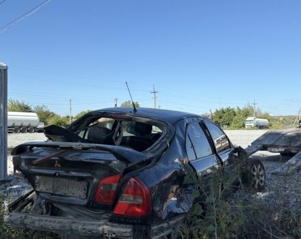 Черный Мицубиси Харизма, объемом двигателя 0 л и пробегом 200 тыс. км за 1000 $, фото 6 на Automoto.ua