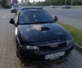 Черный Мицубиси Харизма, объемом двигателя 1.8 л и пробегом 295 тыс. км за 4695 $, фото 1 на Automoto.ua