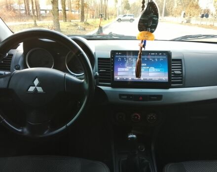 Черный Мицубиси Харизма, объемом двигателя 1.5 л и пробегом 230 тыс. км за 5300 $, фото 3 на Automoto.ua