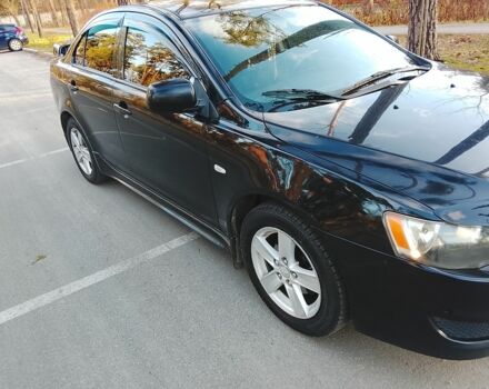 Черный Мицубиси Харизма, объемом двигателя 1.5 л и пробегом 230 тыс. км за 5300 $, фото 2 на Automoto.ua