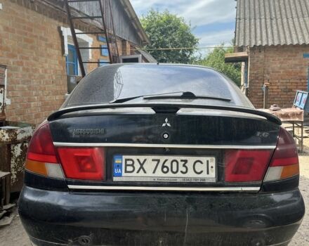 Чорний Міцубісі Харизма, об'ємом двигуна 1.6 л та пробігом 2 тис. км за 1300 $, фото 1 на Automoto.ua